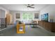 Comfortable living room with large windows at 1228 Hardin Hill Ln, Knightdale, NC 27545