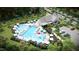Aerial view of the community pool featuring lounge areas, ample seating, and vibrant landscaping, perfect for relaxation at 1252 Hardin Hill Ln, Knightdale, NC 27545
