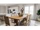 Bright dining room with a wood table and six chairs at 1279 Willow Tree Way, Graham, NC 27253