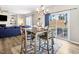 Dining area with table and chairs, open to living room and patio access at 142 Jade St, Smithfield, NC 27577