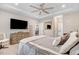 Main bedroom with a dresser, large bed, and access to bathroom at 142 Jade St, Smithfield, NC 27577