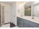 Double vanity bathroom with a large mirror and shower at 1609 Mallard Trace Dr, Wendell, NC 27591