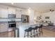 Modern kitchen with granite countertops and stainless steel appliances at 1609 Mallard Trace Dr, Wendell, NC 27591
