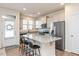 Open kitchen with island, granite countertops, and stainless appliances at 1609 Mallard Trace Dr, Wendell, NC 27591