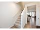 Bright and airy staircase leads to the upper level of the home at 1609 Mallard Trace Dr, Wendell, NC 27591