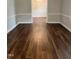 Spacious dining room featuring hardwood floors and elegant trim detail, perfect for entertaining at 1641 Bridgedale Dr, Rocky Mount, NC 27803