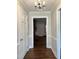 Inviting foyer with hardwood floors and decorative chandelier, leading to living spaces at 1641 Bridgedale Dr, Rocky Mount, NC 27803