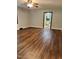 Comfortable living room with hardwood floors and neutral walls creating a cozy living space at 1641 Bridgedale Dr, Rocky Mount, NC 27803