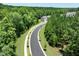 Aerial view of a residential street in a wooded area at 184 Starlight St, Sanford, NC 27330