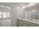 Double vanity bathroom with a view of bedroom at 184 Starlight St, Sanford, NC 27330