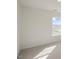 Bright bedroom with carpet and large window at 184 Starlight St, Sanford, NC 27330