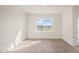 Bright dining room with large windows and hardwood flooring at 184 Starlight St, Sanford, NC 27330