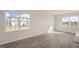 Bright dining room with large windows and hardwood flooring at 184 Starlight St, Sanford, NC 27330