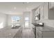 Bright kitchen featuring granite countertops and stainless steel appliances at 184 Starlight St, Sanford, NC 27330