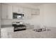 Modern kitchen with stainless steel appliances and granite countertops at 184 Starlight St, Sanford, NC 27330