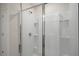 Modern shower with glass enclosure and built-in shelving at 200 Starlight St, Sanford, NC 27330