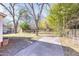 Large backyard with a shed and mature trees at 210 Earl St, Rocky Mount, NC 27804