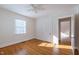 Bright bedroom with hardwood floors and ample natural light at 210 Earl St, Rocky Mount, NC 27804
