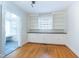 Built-in shelving and hardwood floors in the dining area at 210 Earl St, Rocky Mount, NC 27804