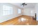 Living room featuring hardwood floors and a ceiling fan at 210 Earl St, Rocky Mount, NC 27804