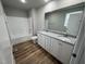 Bathroom with double vanity, granite countertop, and bathtub at 262 Starry Sky Dr, Benson, NC 27504