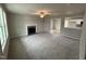 Open living room with a view into the kitchen at 262 Starry Sky Dr, Benson, NC 27504