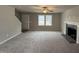 Spacious living room with fireplace and carpet at 262 Starry Sky Dr, Benson, NC 27504