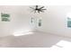 Well-lit bedroom with ceiling fan and carpet at 289 Gaines Trl, Pittsboro, NC 27312
