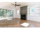 Living room with fireplace, built-ins, and access to deck at 289 Gaines Trl, Pittsboro, NC 27312