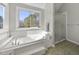Bathroom featuring a jacuzzi tub and glass shower at 265 Verde Rd, Apex, NC 27523