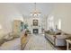 Large living room with high ceilings, a fireplace, and lots of natural light at 265 Verde Rd, Apex, NC 27523