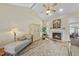 Inviting living room features fireplace, hardwood floors, and ample seating at 265 Verde Rd, Apex, NC 27523