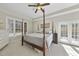 Spacious primary bedroom with lots of natural light and a private balcony at 265 Verde Rd, Apex, NC 27523