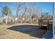 View of expansive backyard and newly constructed back deck, blending indoor-outdoor living and home's exterior at 343 Foster St, Burlington, NC 27217