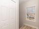 Upstairs hall with view to outside, window, and closet at 343 Foster St, Burlington, NC 27217