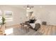 Inviting living room with wood floors, modern furniture, and lots of natural light at 343 Foster St, Burlington, NC 27217