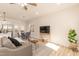 Bright and airy living area featuring an open layout connecting the living room, kitchen, and dining at 343 Foster St, Burlington, NC 27217