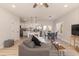 Open-concept living space featuring modern furniture and a seamless flow to the kitchen at 343 Foster St, Burlington, NC 27217
