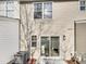 Townhome with sliding glass door leading to patio at 3743 Bison Hill Ln, Raleigh, NC 27604