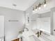 Clean bathroom with white vanity and updated lighting at 3743 Bison Hill Ln, Raleigh, NC 27604