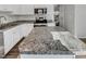 Kitchen with granite countertops and stainless steel appliances at 3743 Bison Hill Ln, Raleigh, NC 27604