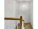 Elegant wooden staircase with chandelier at 3743 Bison Hill Ln, Raleigh, NC 27604