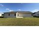 House exterior showcasing a backyard and patio at 39 Shiloh Dr, Lillington, NC 27546