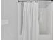Simple bathroom with shower/tub and white curtain at 3901 La Varra Dr, Clayton, NC 27520