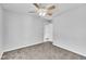 Simple bedroom with ceiling fan and neutral carpeting at 3901 La Varra Dr, Clayton, NC 27520