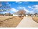 House exterior with a long driveway and mature trees at 3901 La Varra Dr, Clayton, NC 27520