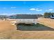 House back view, deck, and spacious backyard at 3901 La Varra Dr, Clayton, NC 27520