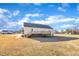 House back view, deck, and spacious backyard at 3901 La Varra Dr, Clayton, NC 27520