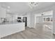 Modern kitchen with white cabinets and granite countertops at 3901 La Varra Dr, Clayton, NC 27520