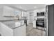 Modern kitchen with stainless steel appliances and granite countertops at 3901 La Varra Dr, Clayton, NC 27520